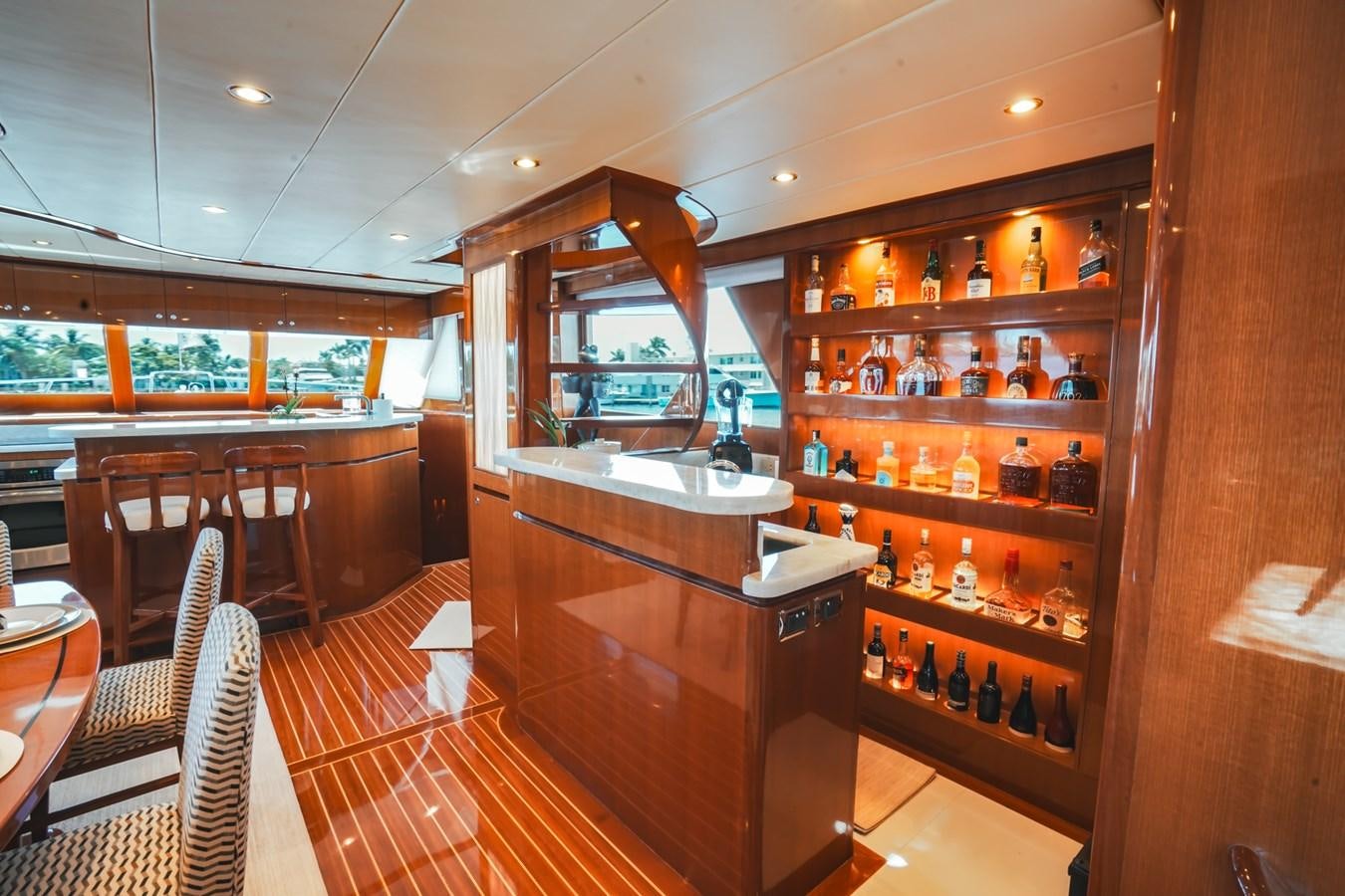 a bar with a bar and shelves aboard VIAGGIO Yacht for Sale
