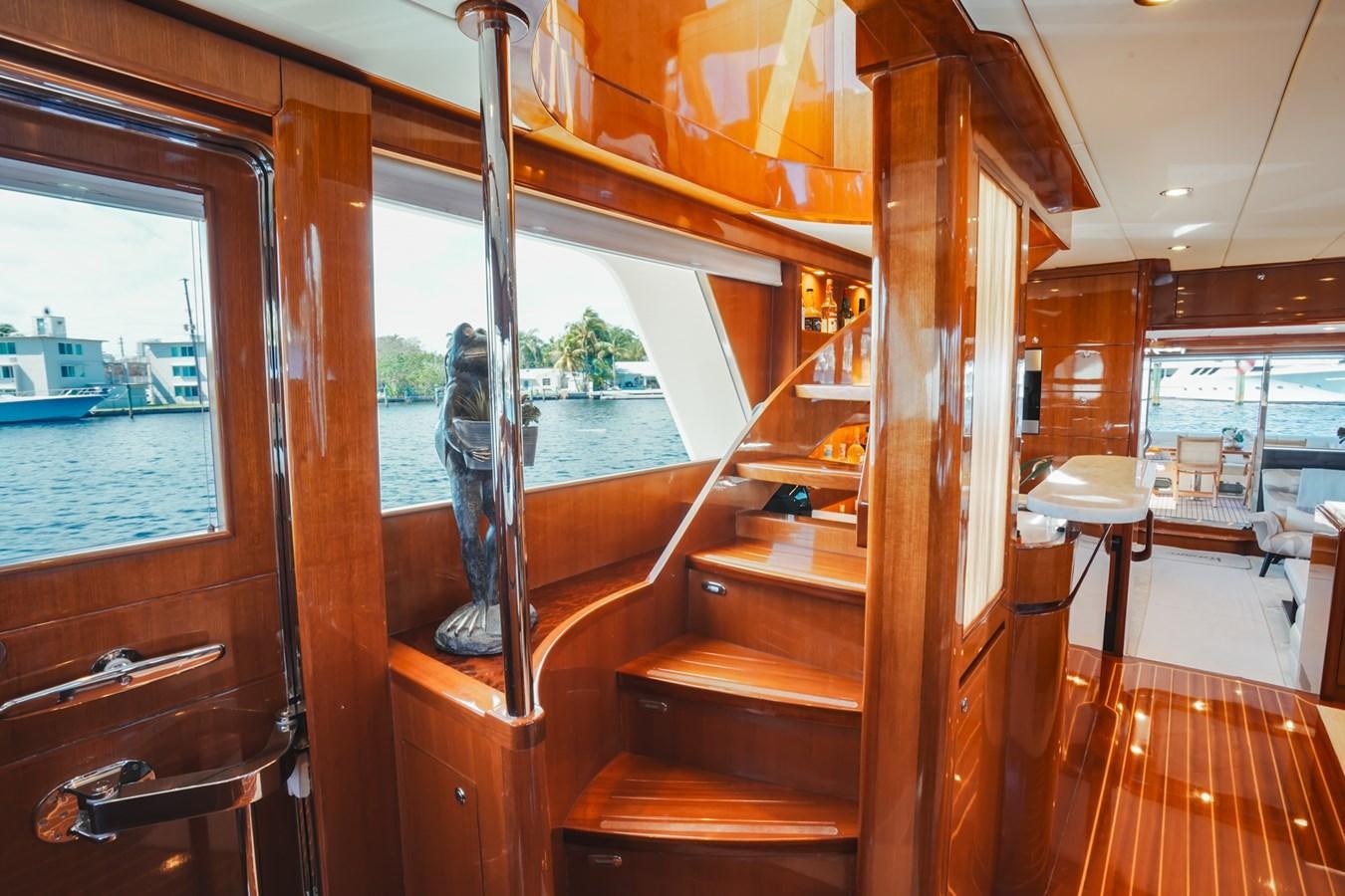 a wooden staircase in a house aboard VIAGGIO Yacht for Sale