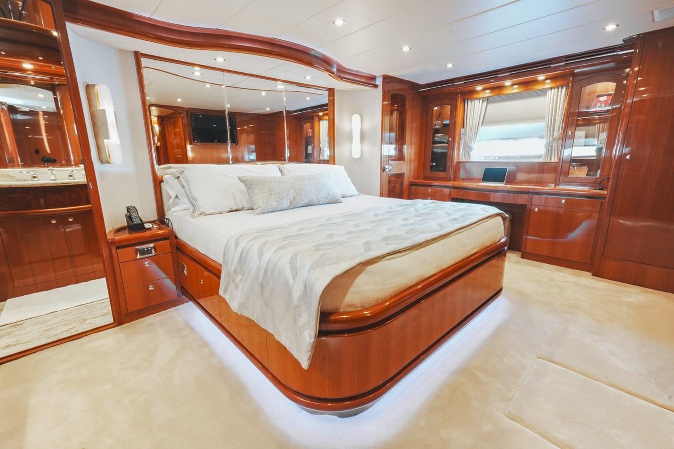 a bed in a room aboard VIAGGIO Yacht for Sale
