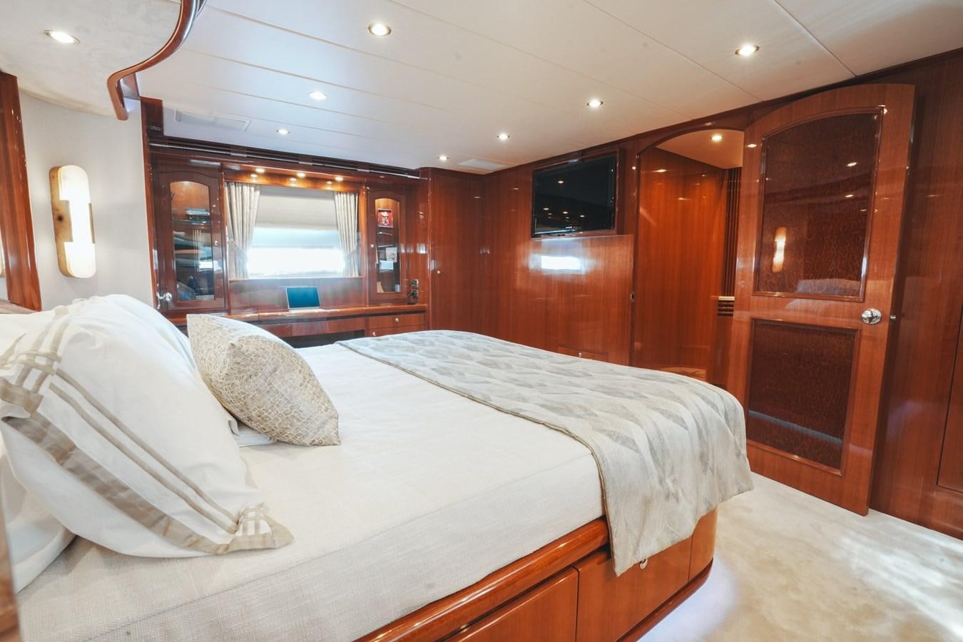 a bed in a room aboard VIAGGIO Yacht for Sale