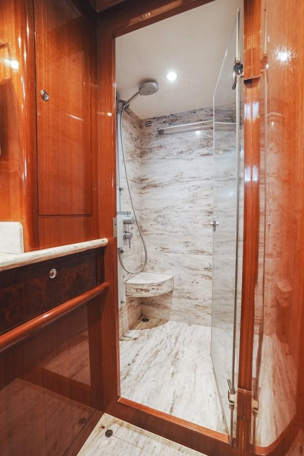 a shower with a glass door aboard VIAGGIO Yacht for Sale