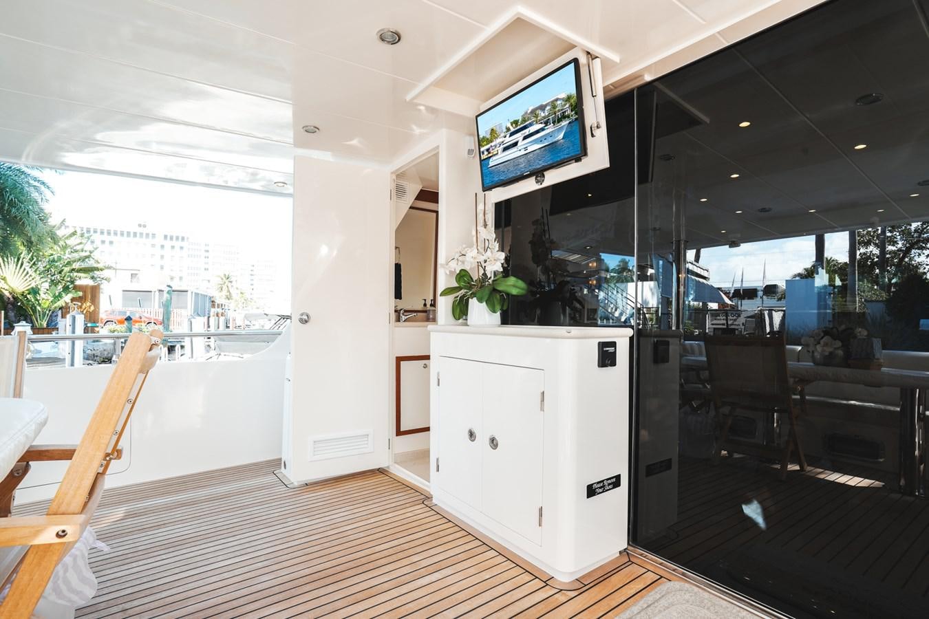 a room with a large screen aboard VIAGGIO Yacht for Sale
