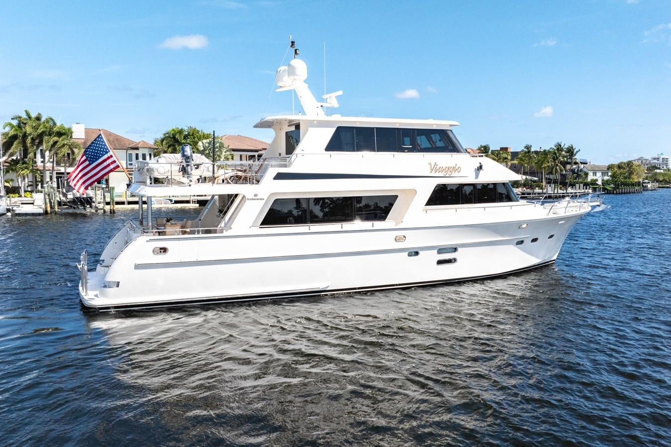 a large white boat on the water aboard VIAGGIO Yacht for Sale