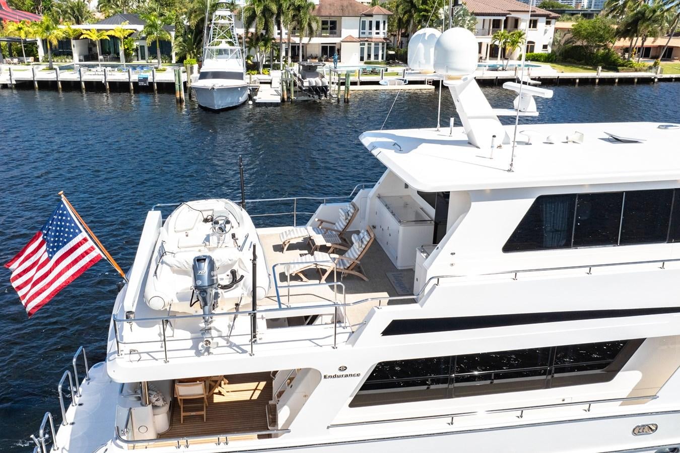 a boat with a flag on it aboard VIAGGIO Yacht for Sale