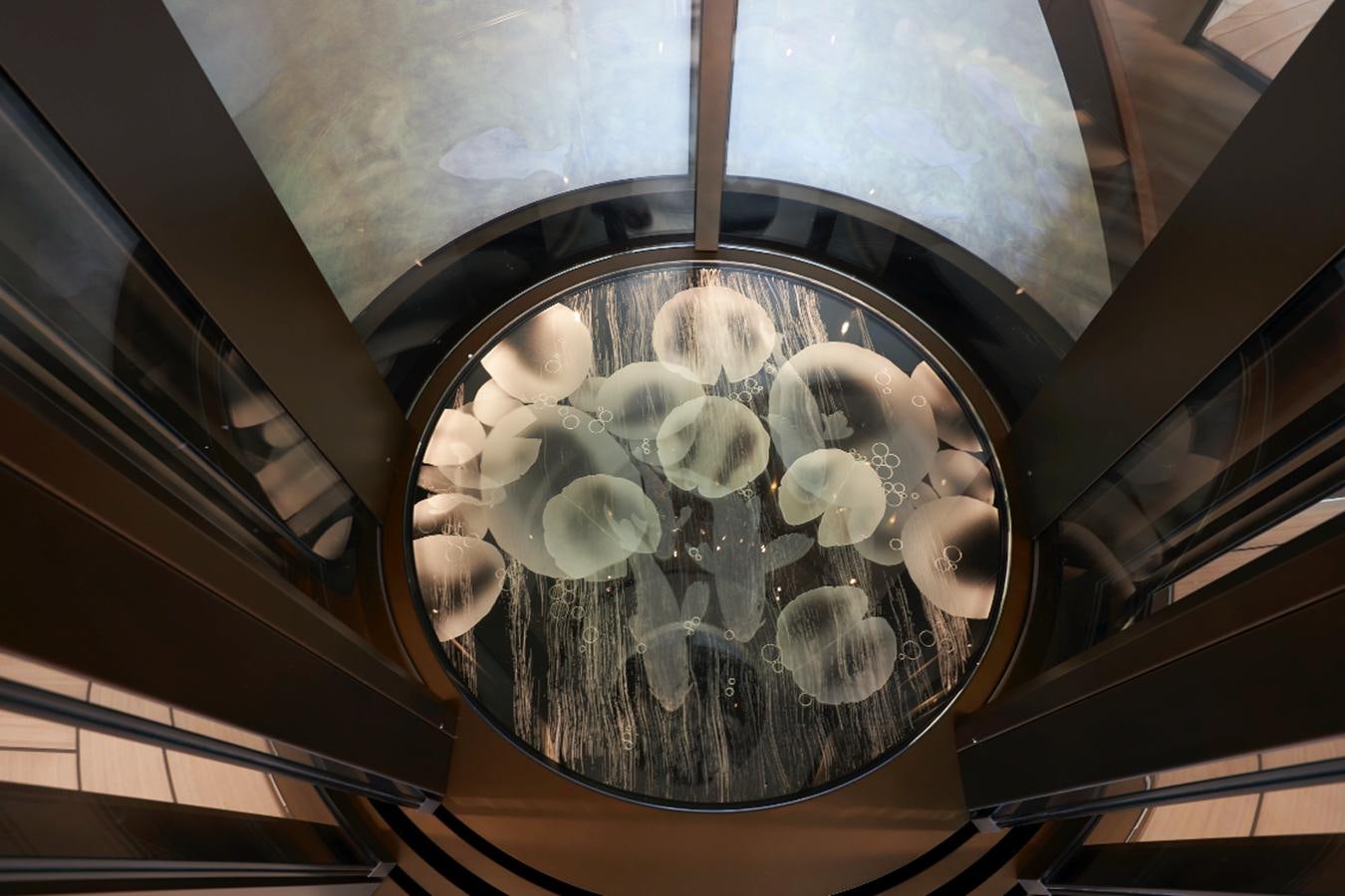 a chandelier from a ceiling aboard LUNA Yacht for Sale