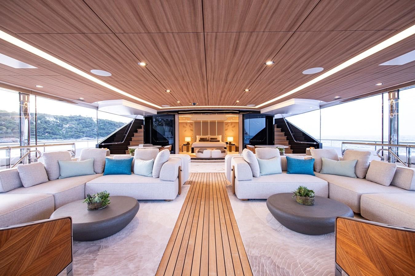 a living room with a large window aboard LUNA Yacht for Sale