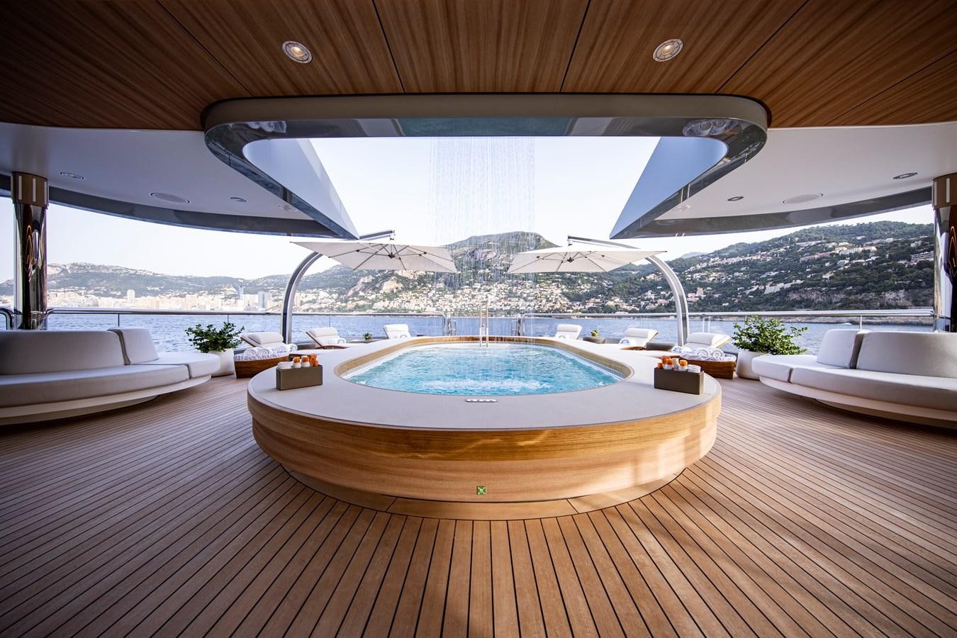 a large indoor swimming pool aboard LUNA Yacht for Sale