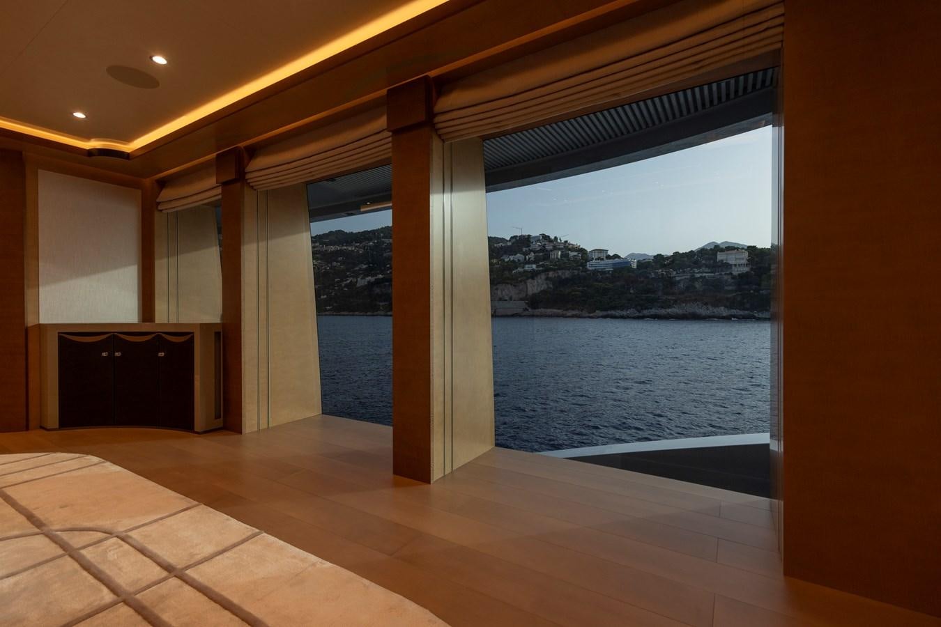 a large open door leading to a large body of water aboard LUNA Yacht for Sale