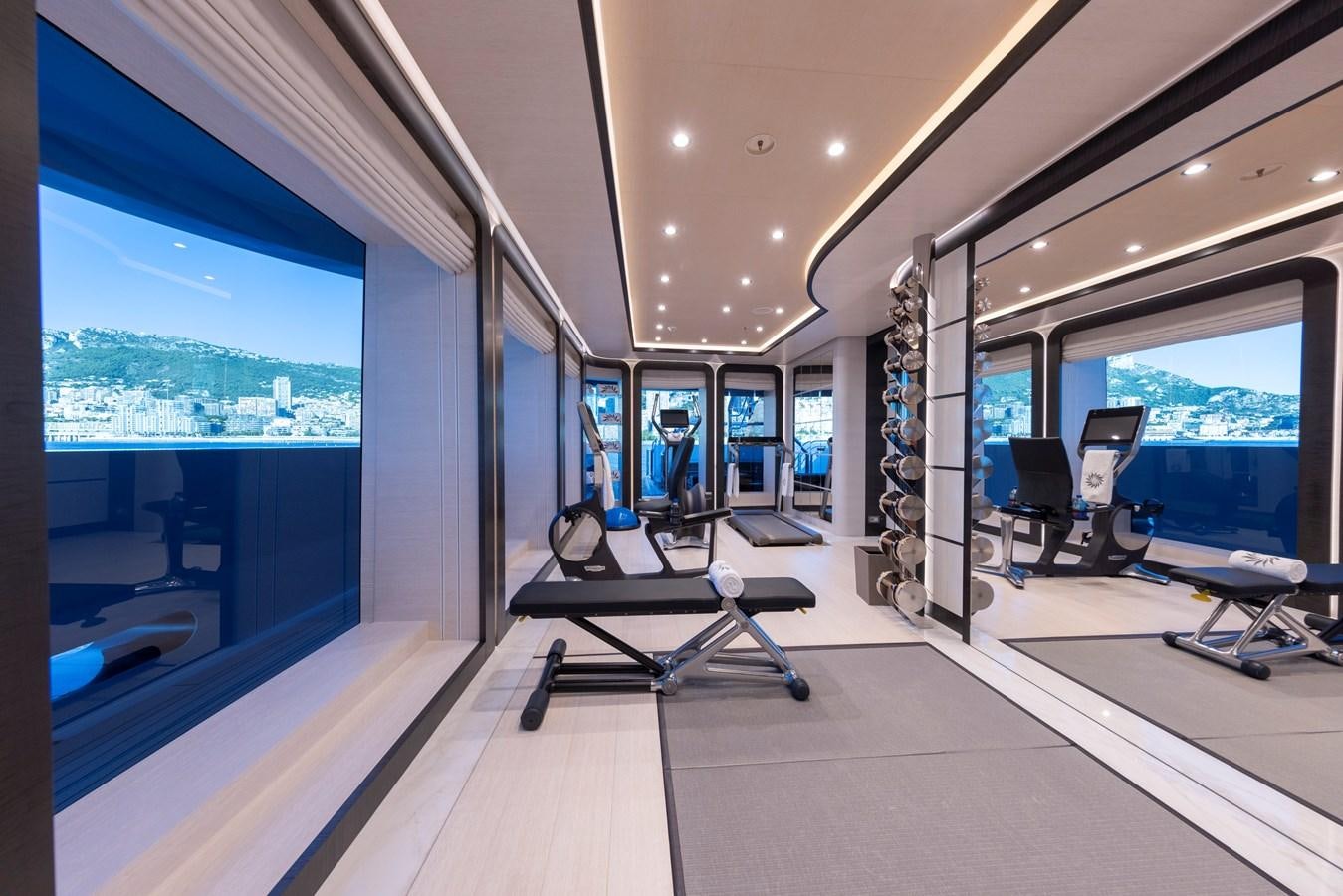 inside of a building with a view of the city aboard LUNA Yacht for Sale
