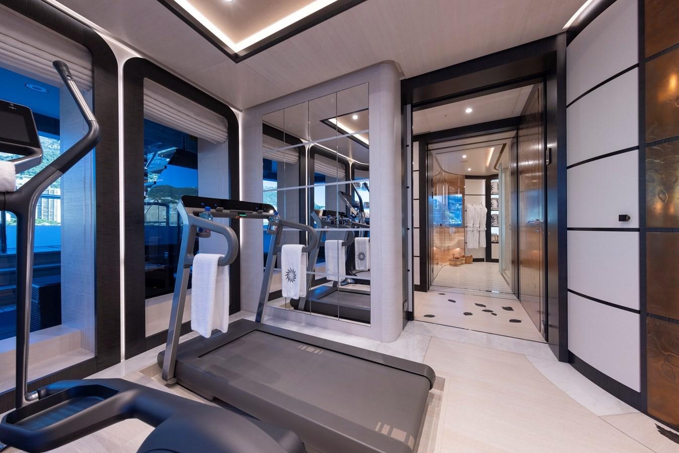 a room with glass doors aboard LUNA Yacht for Sale