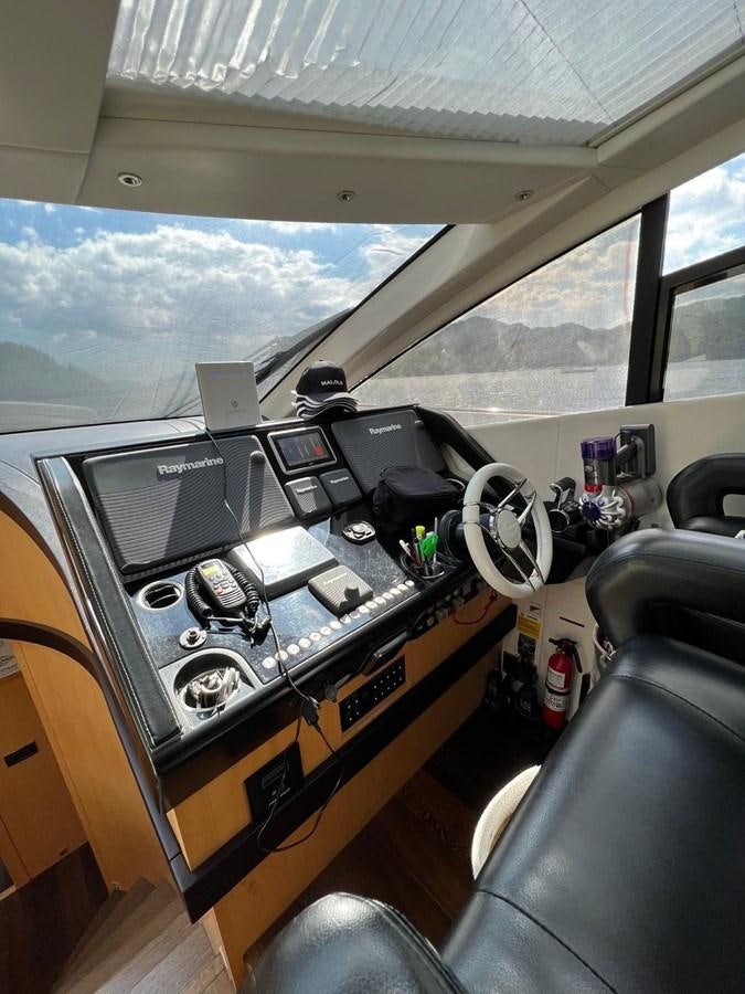 a room with a desk and a chair aboard SUNSEEKER 75 YACHT Yacht for Sale