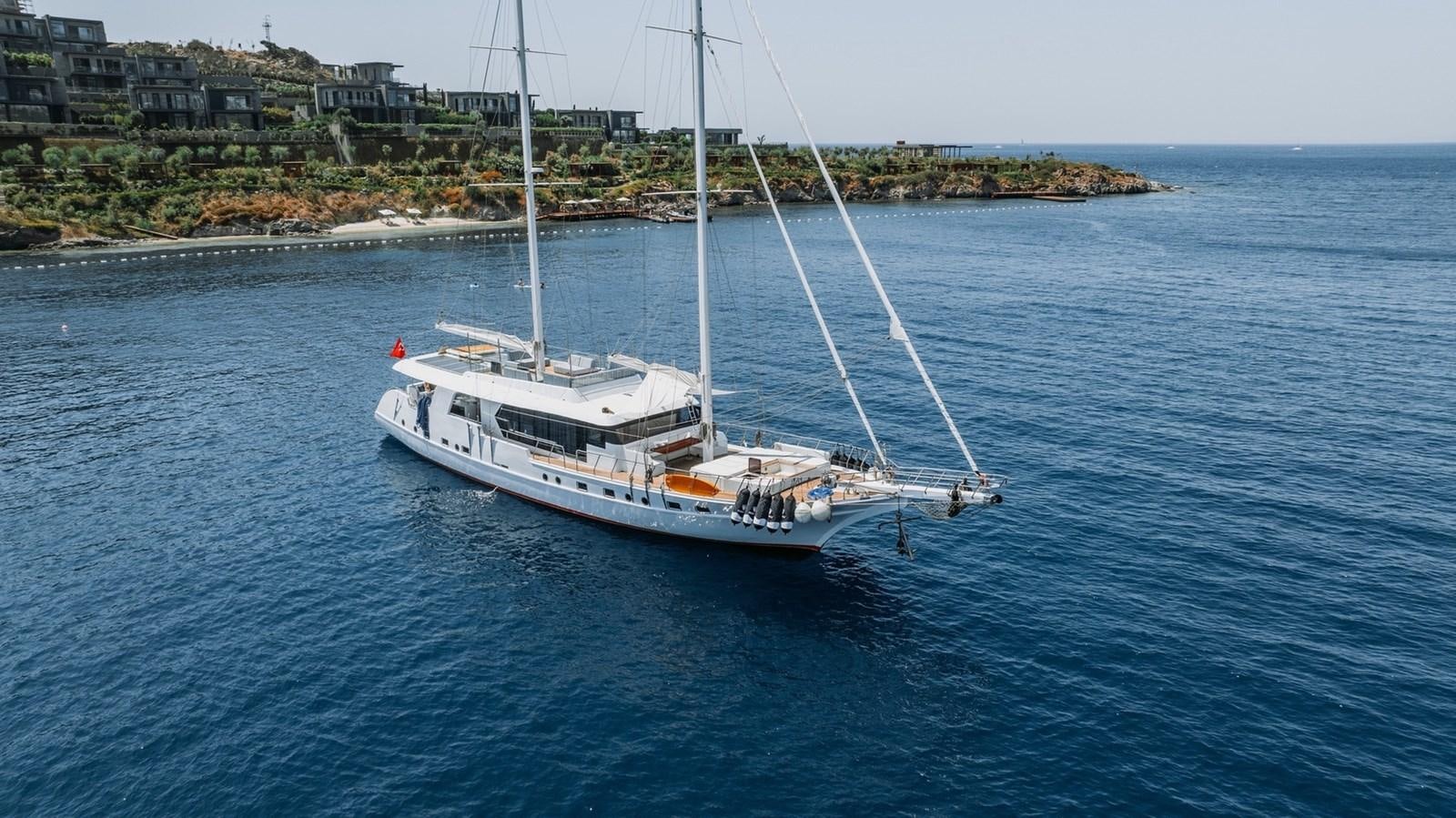 a boat sailing on the water aboard CUSTOM MADE MOTORSAILER Yacht for Sale