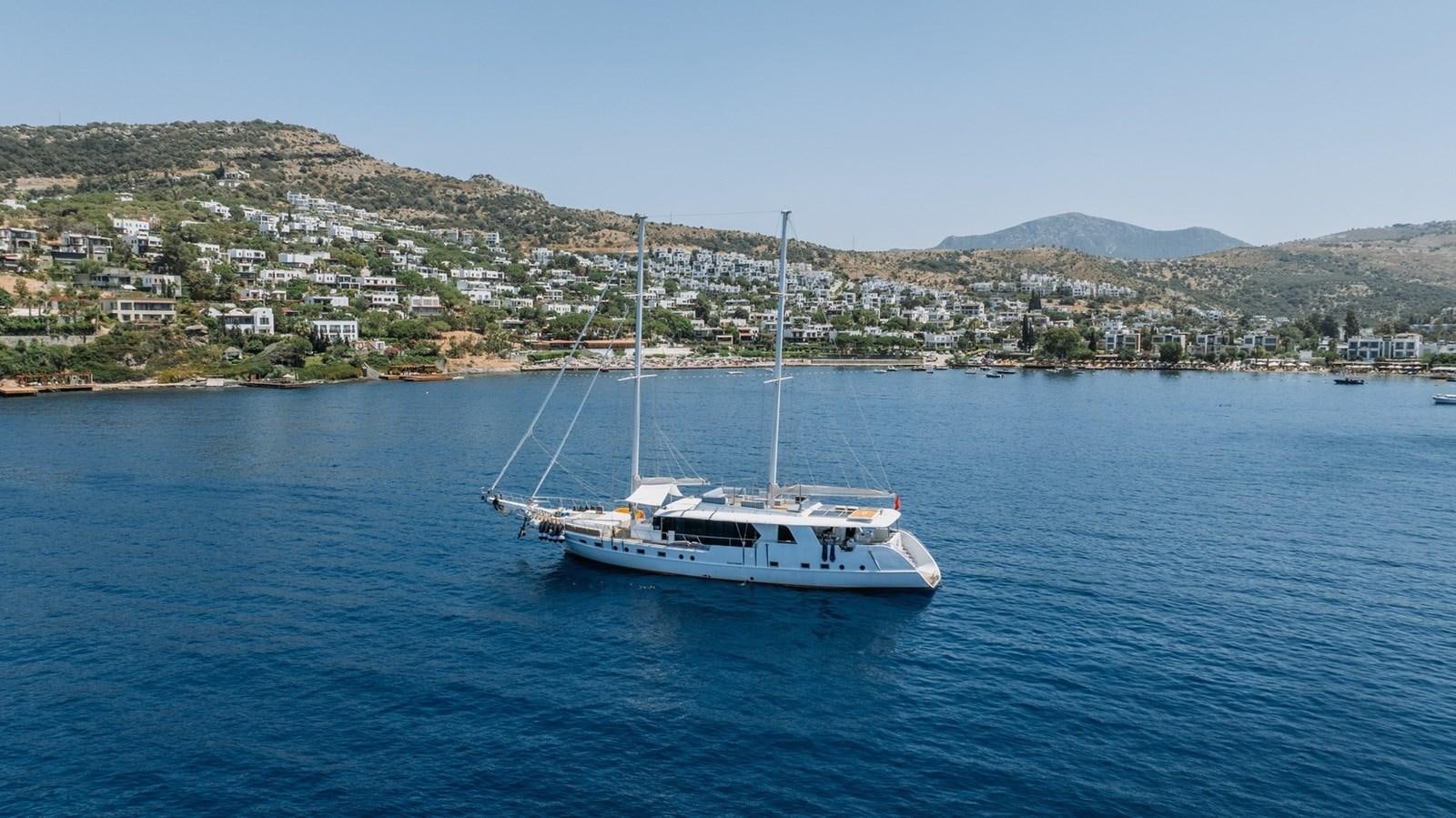 a boat in the water aboard CUSTOM MADE MOTORSAILER Yacht for Sale