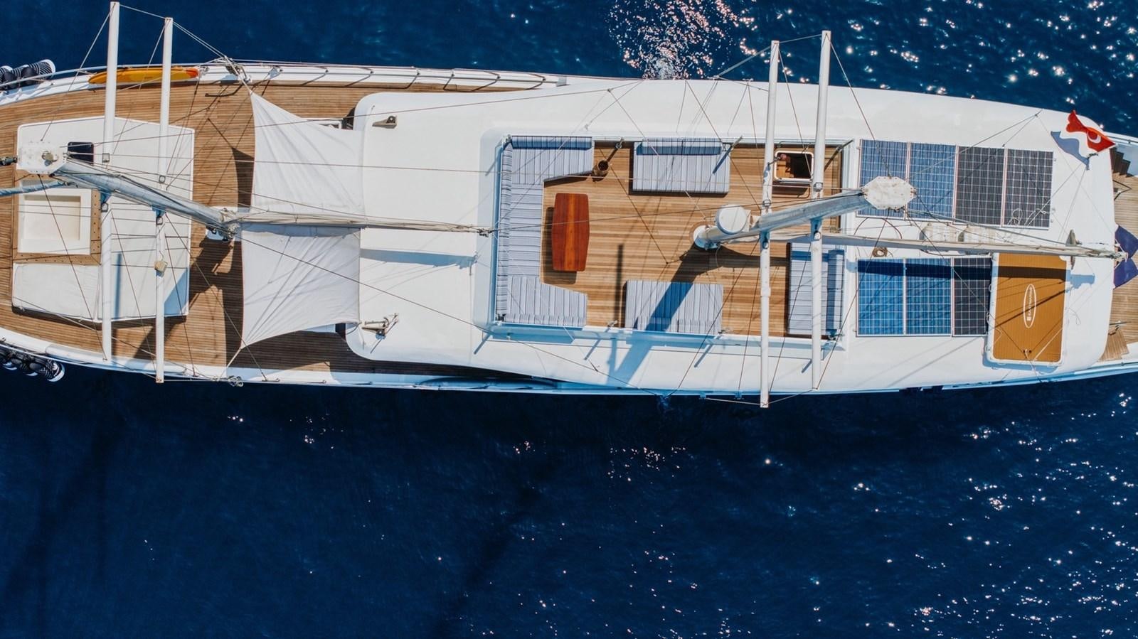 a large white boat in the water aboard CUSTOM MADE MOTORSAILER Yacht for Sale