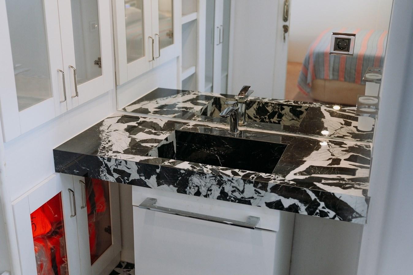 a sink in a kitchen aboard CUSTOM MADE MOTORSAILER Yacht for Sale