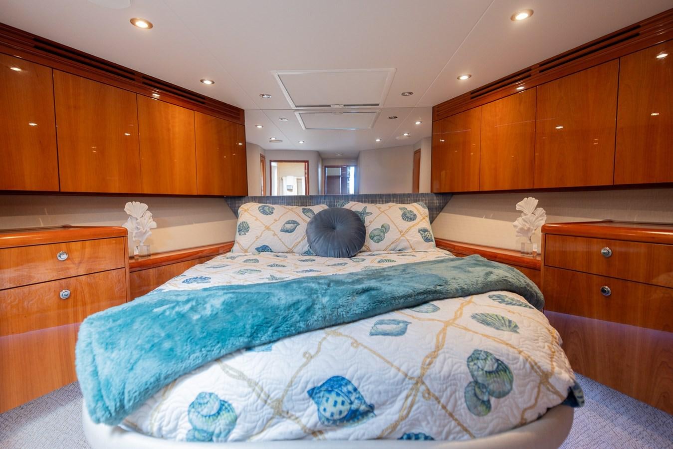 a bed in a room aboard TEMPTATION Yacht for Sale