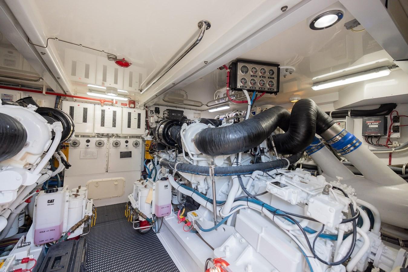 a machine with a large metal pipe aboard TEMPTATION Yacht for Sale