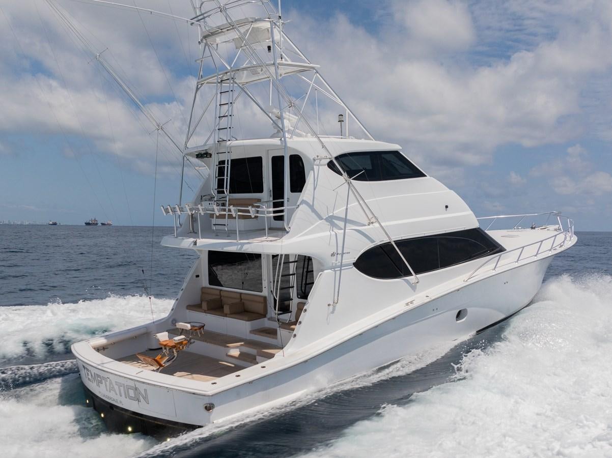 a boat on the water aboard TEMPTATION Yacht for Sale