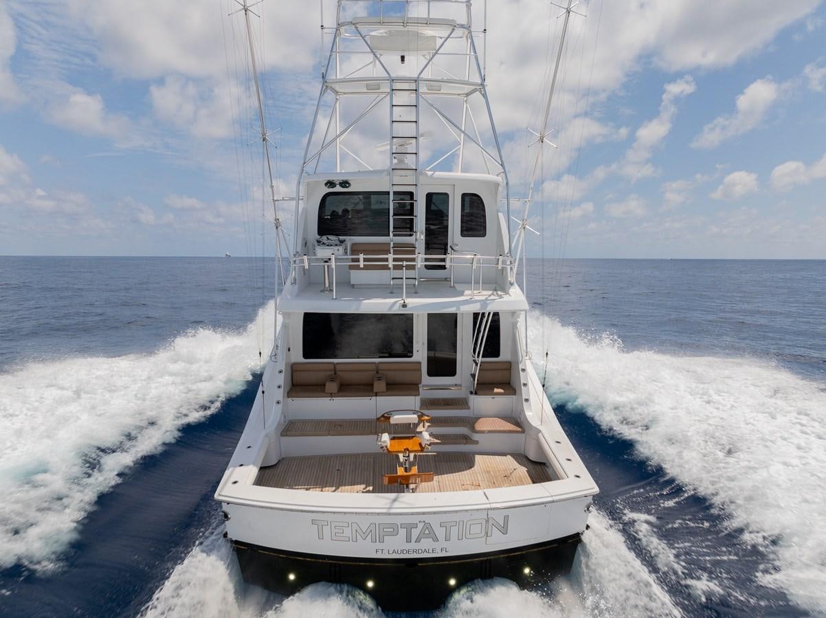 a boat on the water aboard TEMPTATION Yacht for Sale