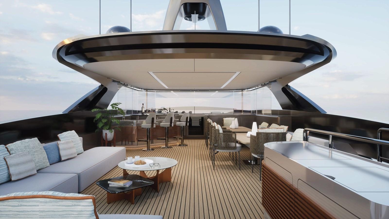 a large white yacht in a large room with a table and chairs aboard NL30 Yacht for Sale