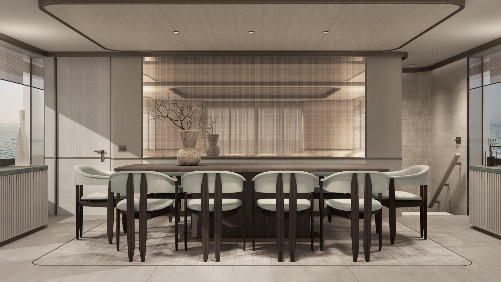 a large kitchen with a table and chairs aboard NL30 Yacht for Sale