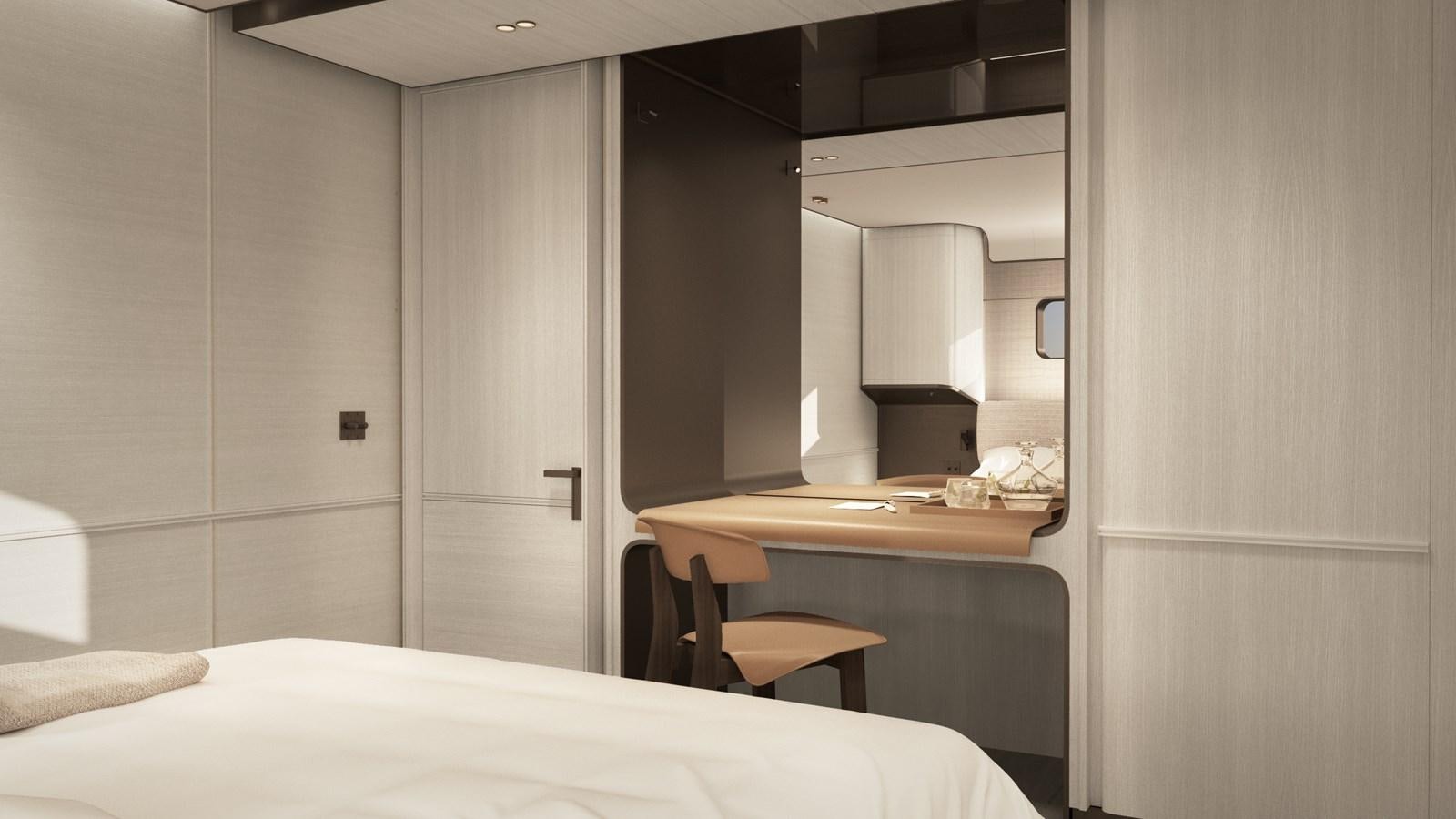 a room with a desk and a bed aboard NL30 Yacht for Sale