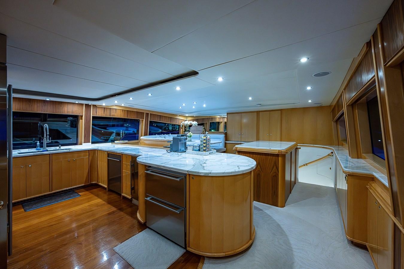 a large kitchen with a large island aboard WIRE WE HERE Yacht for Sale