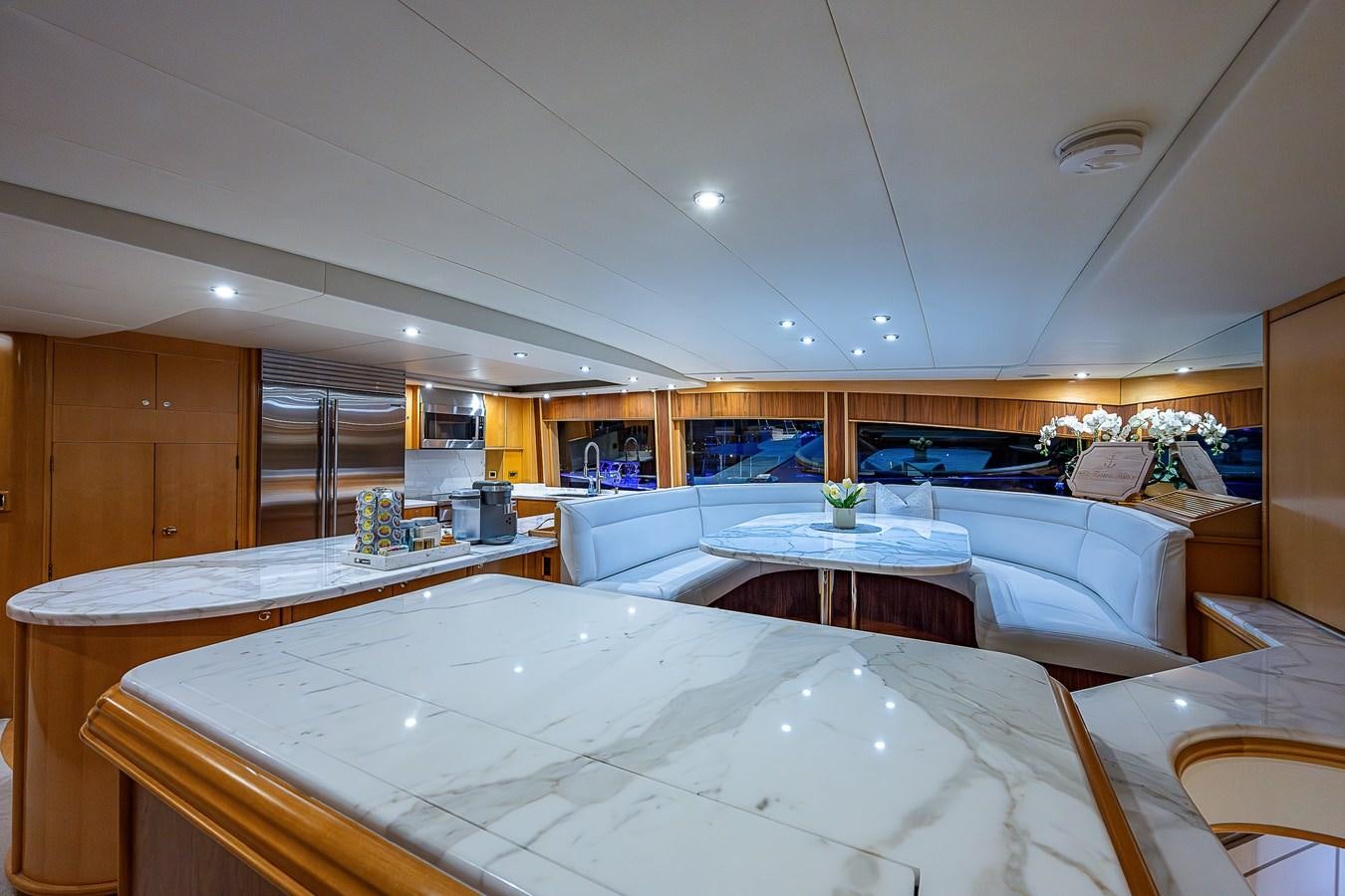 a room with a bed and a table aboard WIRE WE HERE Yacht for Sale