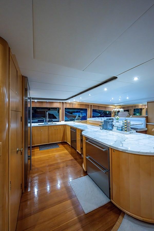 a kitchen with a large island aboard WIRE WE HERE Yacht for Sale