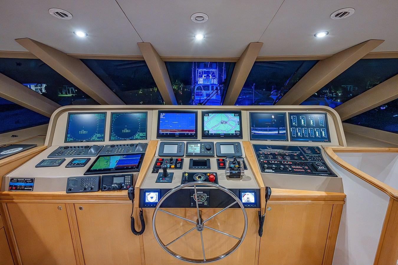 a control panel with many screens aboard WIRE WE HERE Yacht for Sale