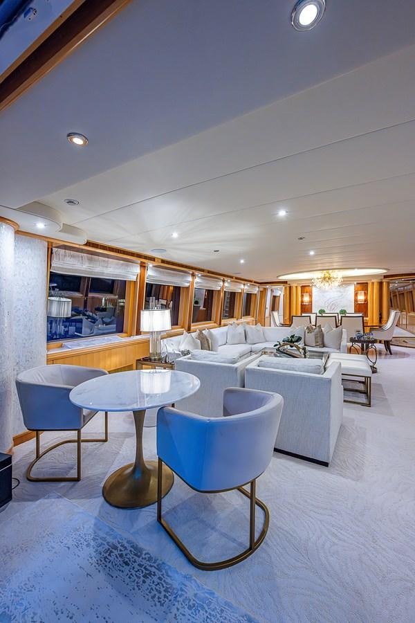 a room with a table and chairs aboard WIRE WE HERE Yacht for Sale