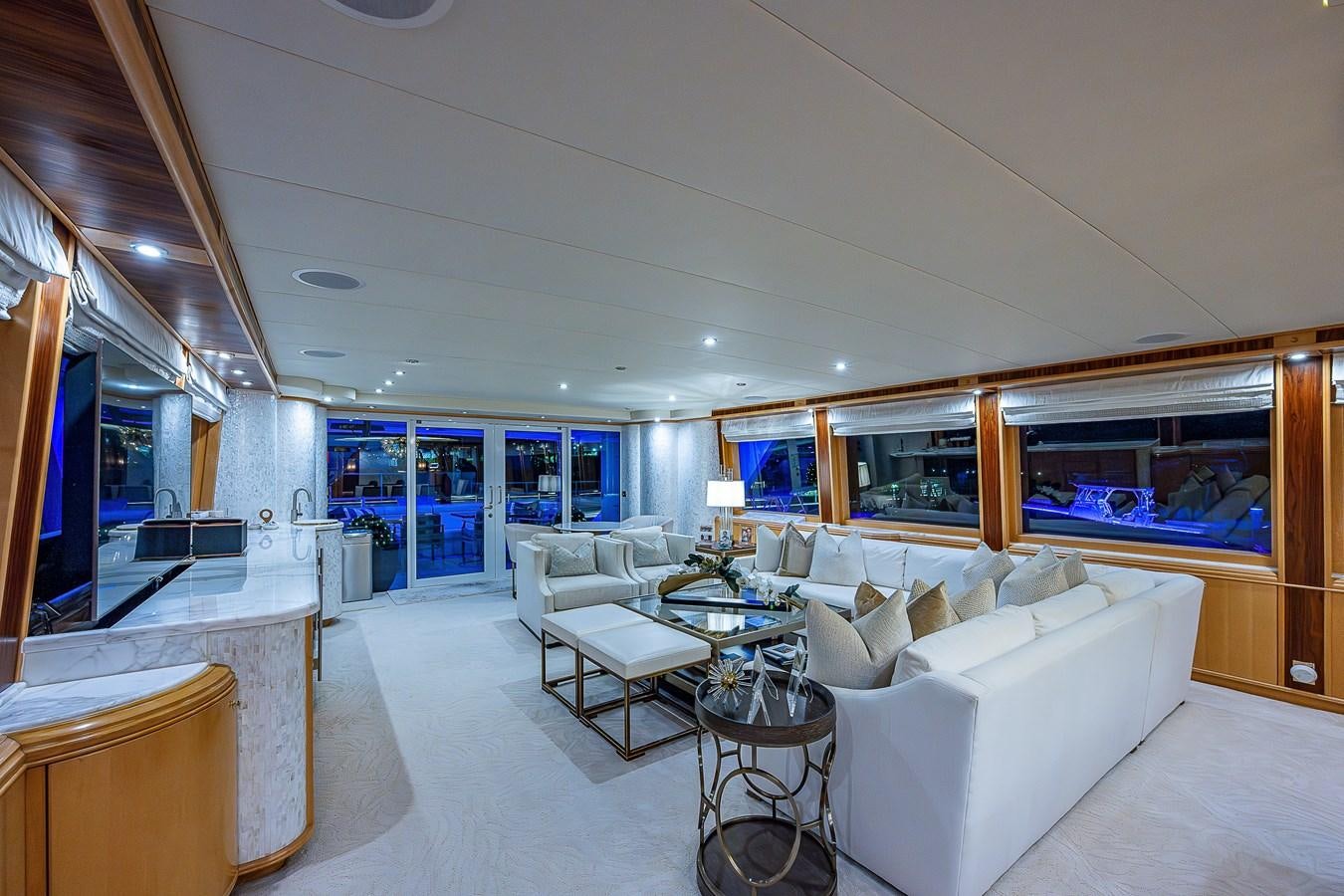 a room with a couch and a table aboard WIRE WE HERE Yacht for Sale