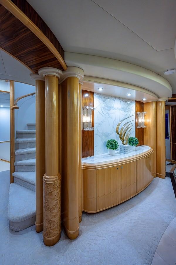 a room with a large pillar and a marble counter top aboard WIRE WE HERE Yacht for Sale