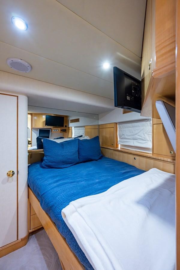 a room with bunk beds aboard WIRE WE HERE Yacht for Sale
