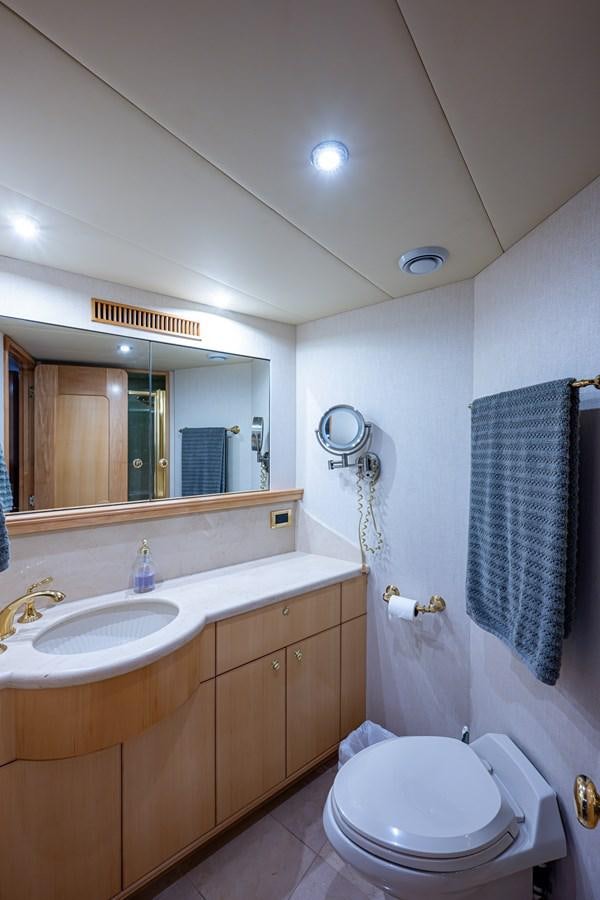 a bathroom with a sink and a toilet aboard WIRE WE HERE Yacht for Sale