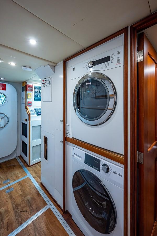 a washing machine in a room aboard WIRE WE HERE Yacht for Sale