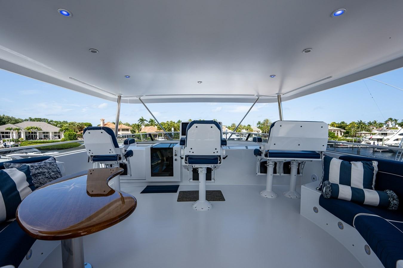 a group of chairs on a deck aboard WIRE WE HERE Yacht for Sale