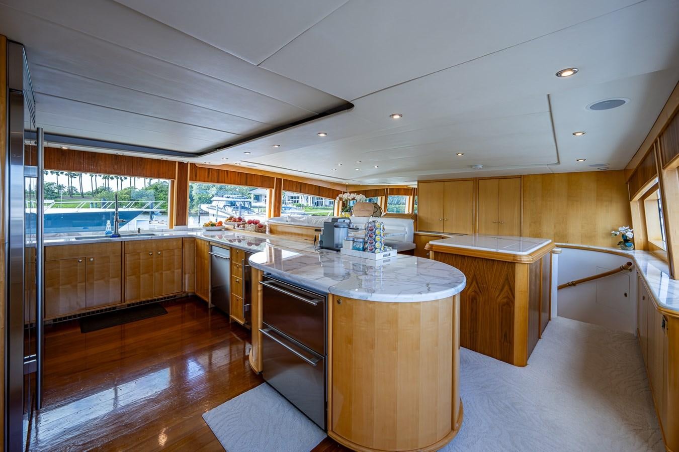 a kitchen with a large island aboard WIRE WE HERE Yacht for Sale