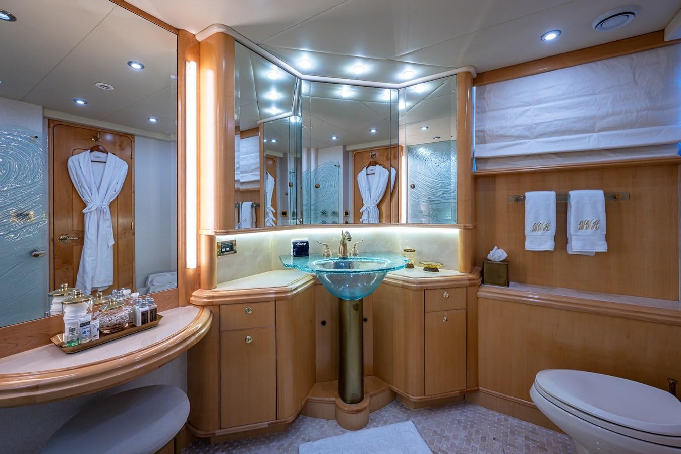 a bathroom with a sink and a mirror aboard WIRE WE HERE Yacht for Sale