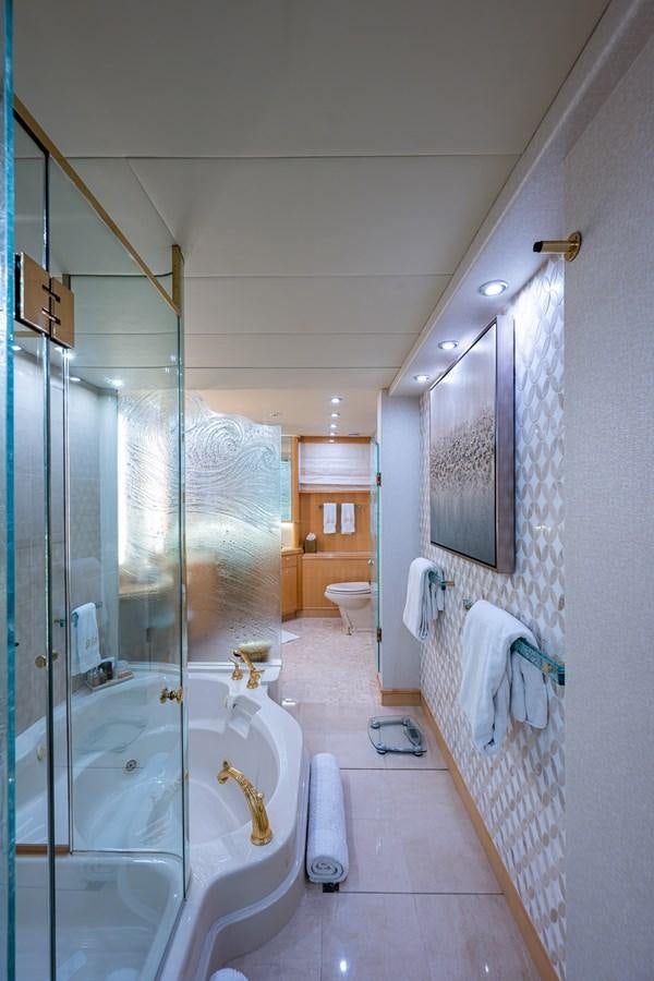 a bathroom with a shower and a sink aboard WIRE WE HERE Yacht for Sale