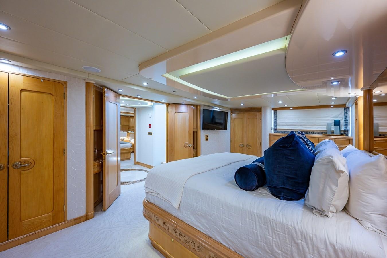 a room with a bed and a television aboard WIRE WE HERE Yacht for Sale