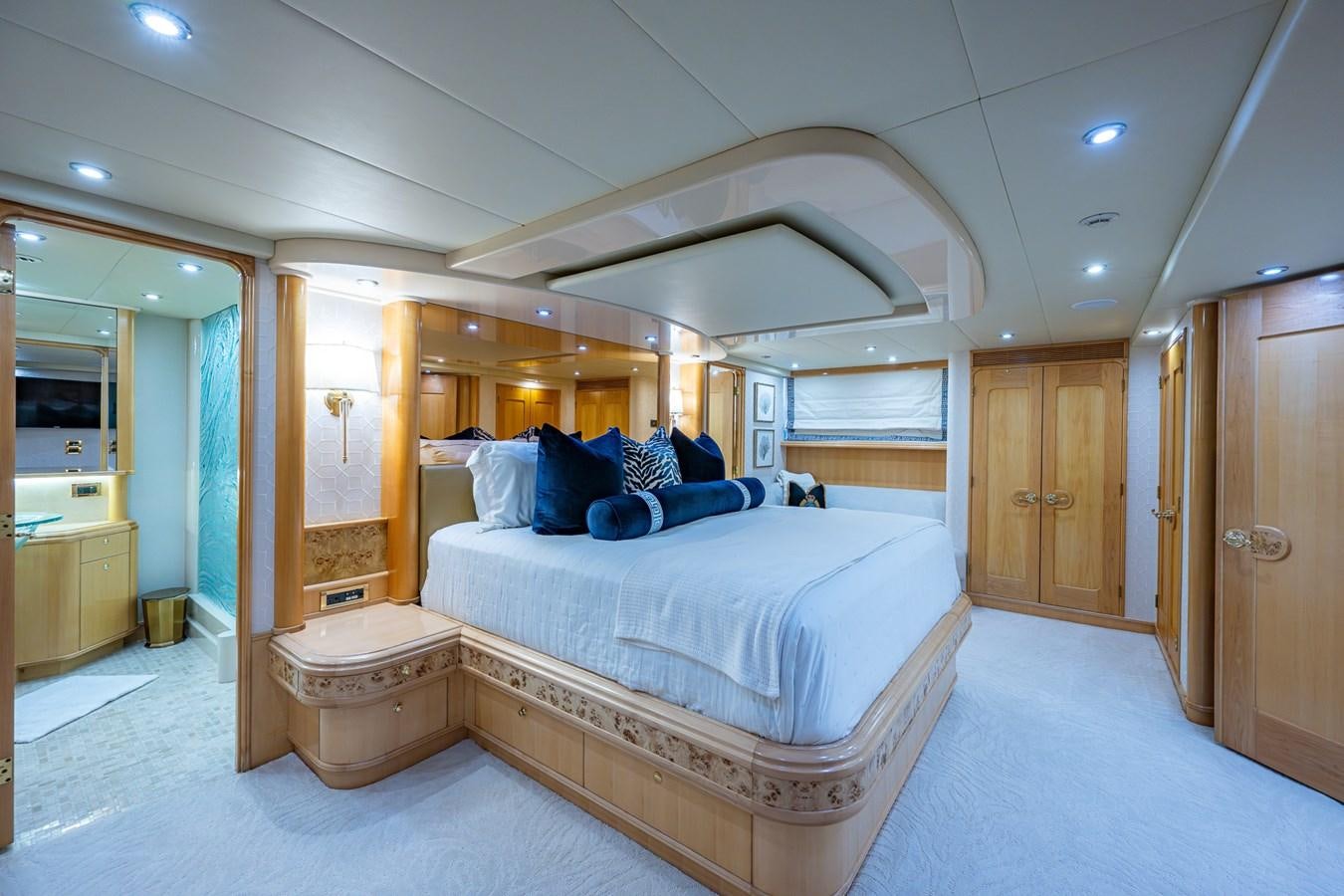 a large bedroom with a bed aboard WIRE WE HERE Yacht for Sale