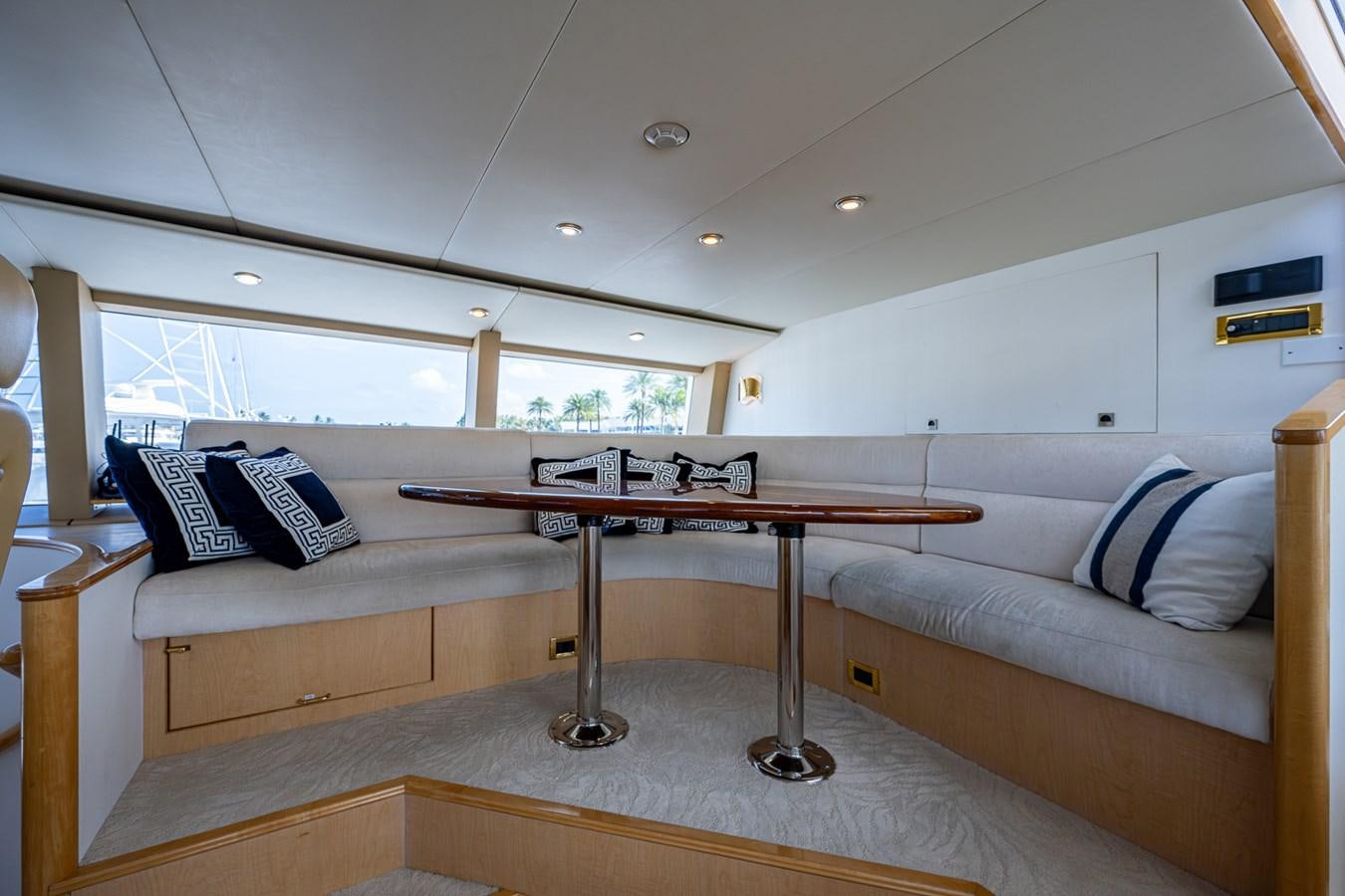 a table with a pool table aboard WIRE WE HERE Yacht for Sale
