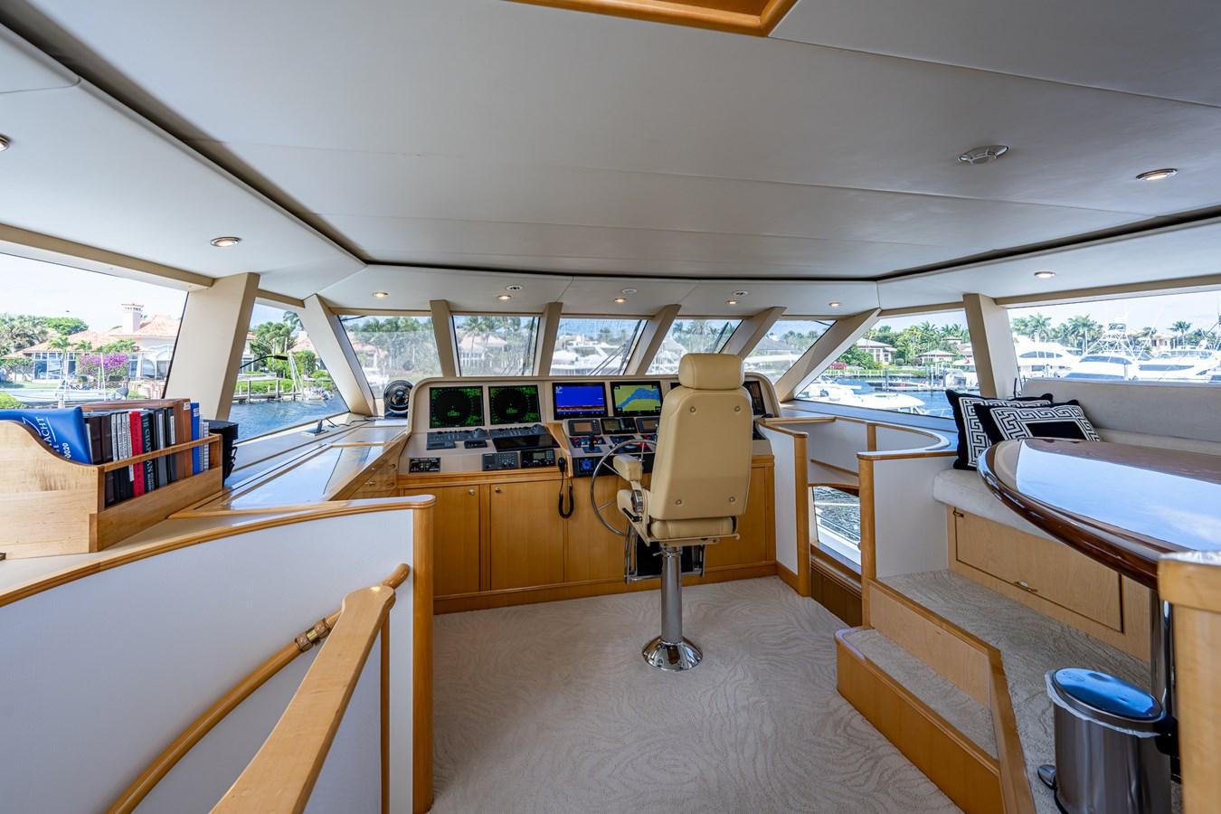 inside of a building with tables and chairs aboard WIRE WE HERE Yacht for Sale
