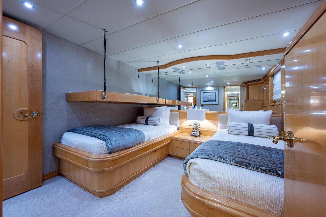 a room with a couple of beds aboard WIRE WE HERE Yacht for Sale