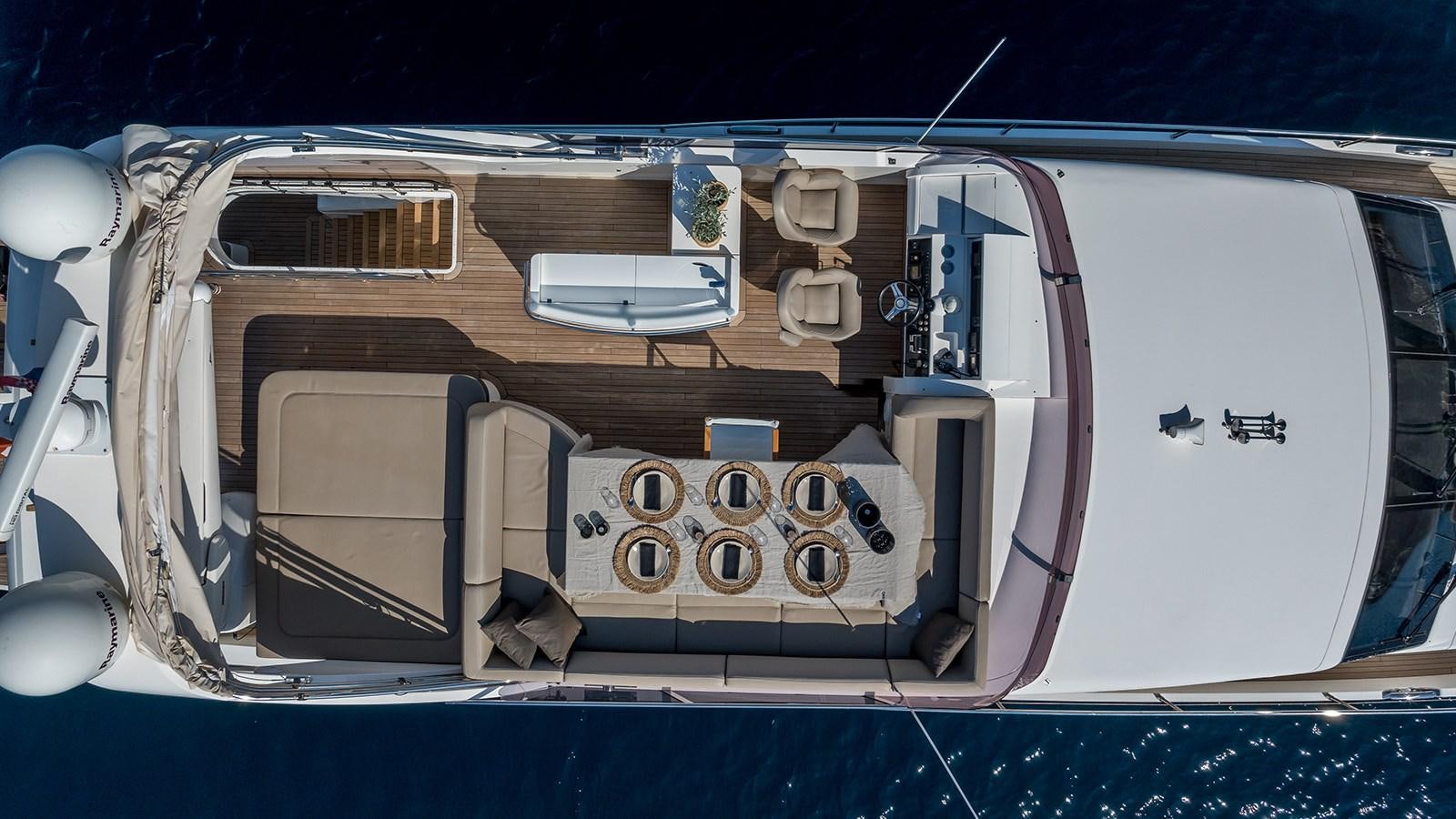 a car with its doors open aboard SEA DREAM II Yacht for Sale
