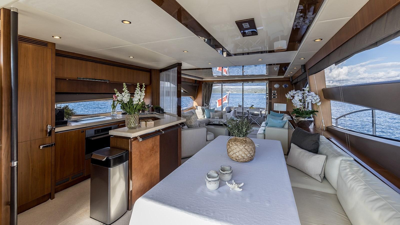 a kitchen and living room aboard SEA DREAM II Yacht for Sale
