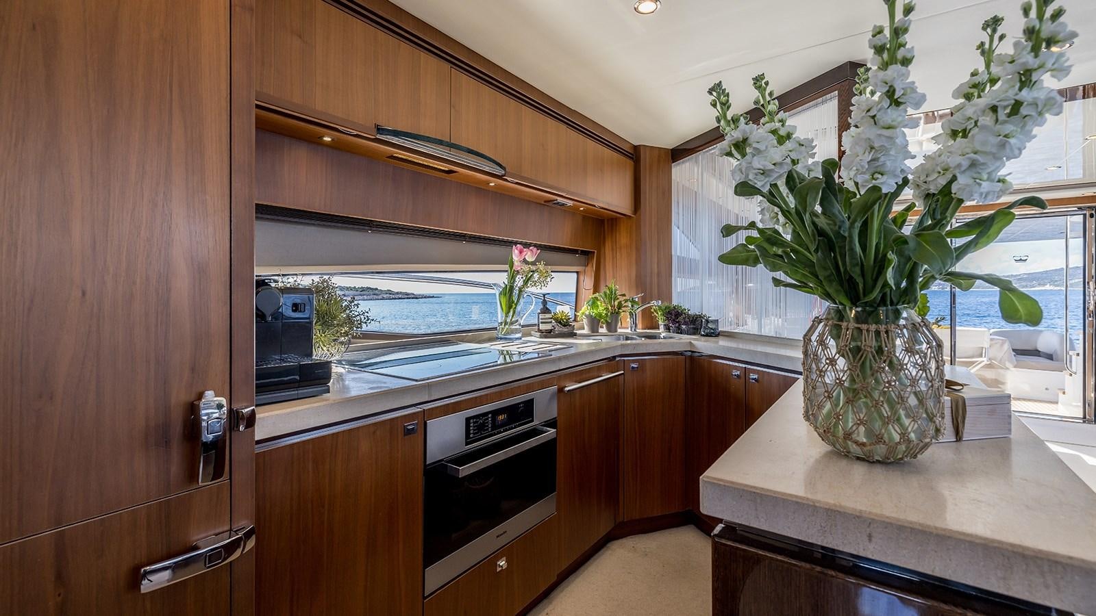 a vase with flowers in it aboard SEA DREAM II Yacht for Sale