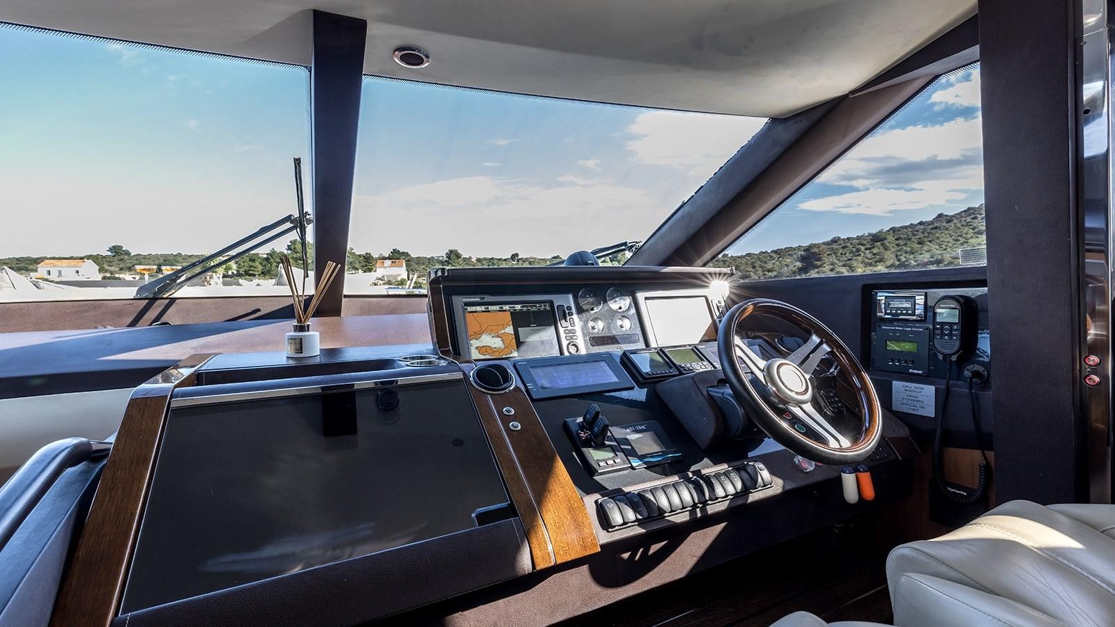 inside of a car aboard SEA DREAM II Yacht for Sale