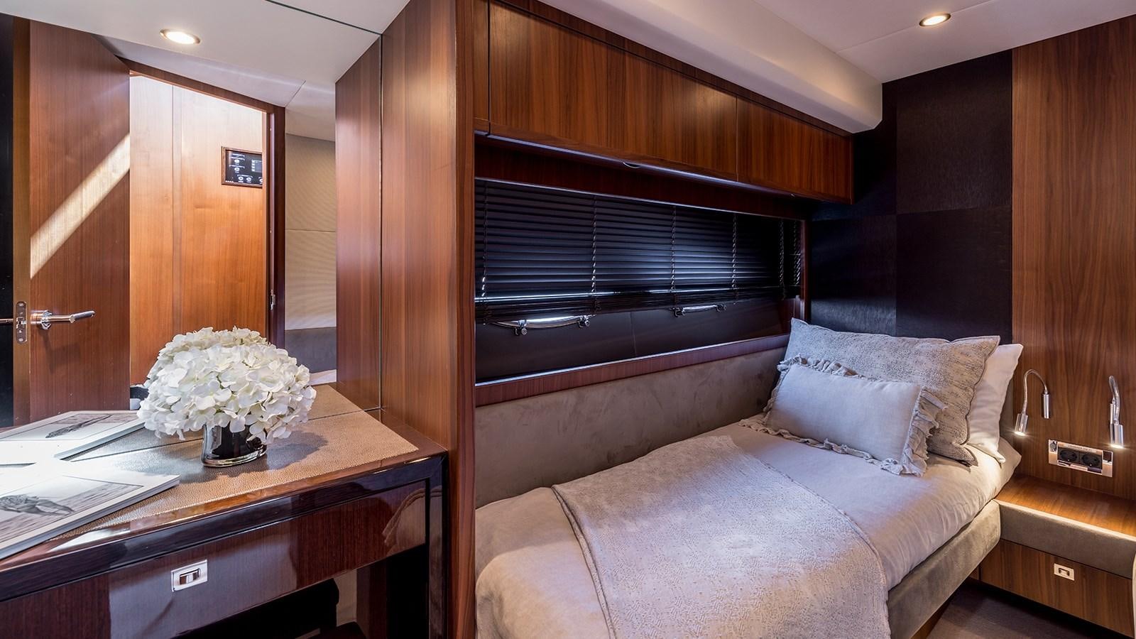 a living room with a couch aboard SEA DREAM II Yacht for Sale